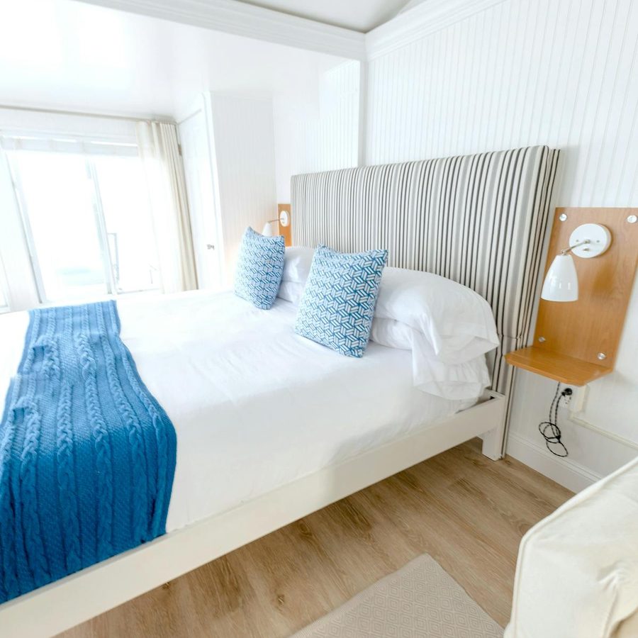 Bright minimalist upscale hotel room with clean design and natural light